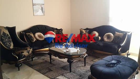 Furnished apartment for rent with a view of the main street in Al Mostasmer Al Sagheer - Sheikh Zayed City