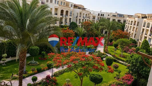 Apartment for sale with kitchen and dressing room in Hadayek El Mohandeseen Compound, Sheikh Zayed, opposite Saudi Market, prime location.