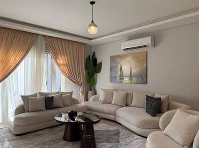 164 sqm furnished apartment (hotel-style) for rent in October Plaza Sodic compound, overlooking the Boulevard Axis.