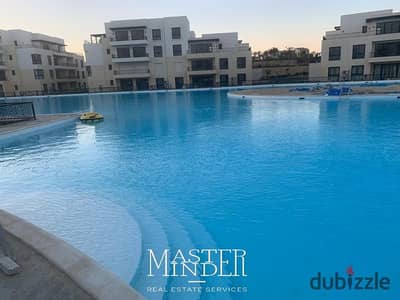 Direct on Lagoon Furnished Chalet with garden for sale in Marassi North Coast by Emaar Misr