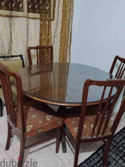 سفره خشب زان و اربع كراسي و زجاج السفره