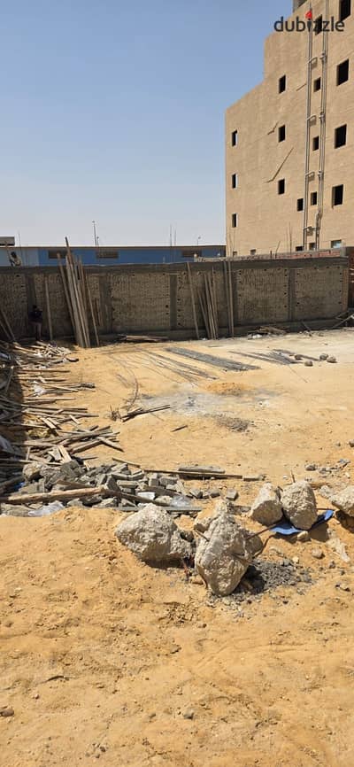 Industrial land for sale in New Cairo's Fifth Settlement Industrial Area. The land area is 300 square meters, located on a corner lot on a prime stree Industrial land for sale in New Cairo's Fifth Settlement Industrial Area. The land area is 300 square meters, located on a corner lot on a prime stree