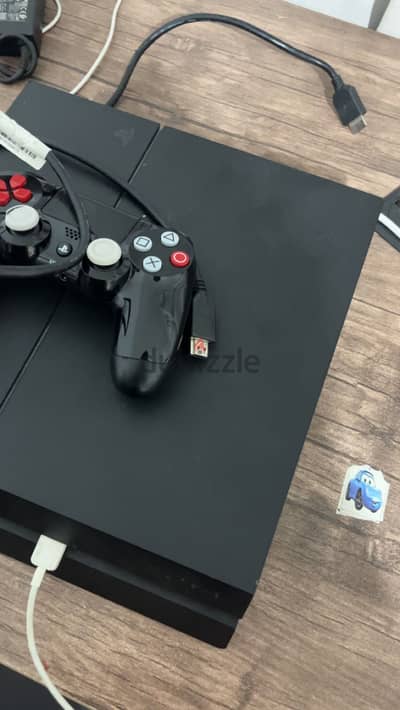 Ps4 fat 500gb  معاها العاب