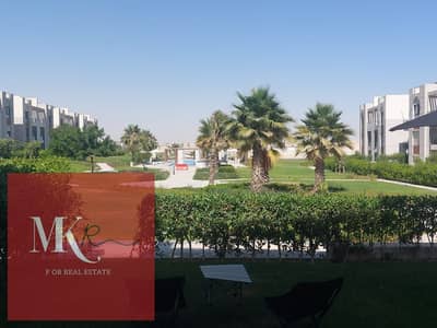 Ground floor chalet for sale with a garden 2 bedrooms, prime location in Gaia North Coast, Ras El Hekma.