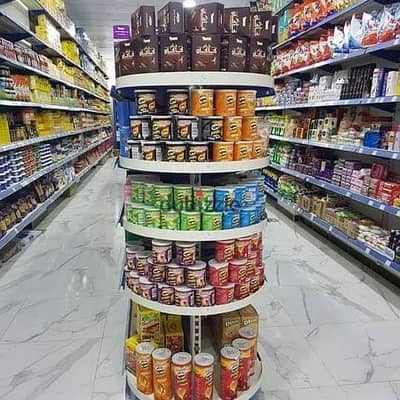 Commercial store 100 m for rent suitable for any commercial activity, super-lux finish, all facilities available: water, electricity, and bathroom in Alexandria, Al-Ajami, kilometer 21, October Street, main road before the gate in a very distinguished location.