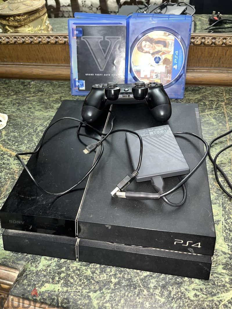 Ps4 500gb +1tb hard + games and controller 2