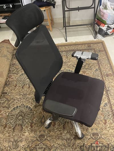 All black office chair with wheels and adjustable height