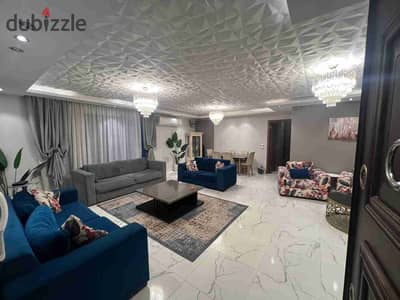 For rent, first occupancy, furnished hotel apartment with hotel finishing near Safir Hotel in Al-Midan, an upscale and distinguished area in Dokki