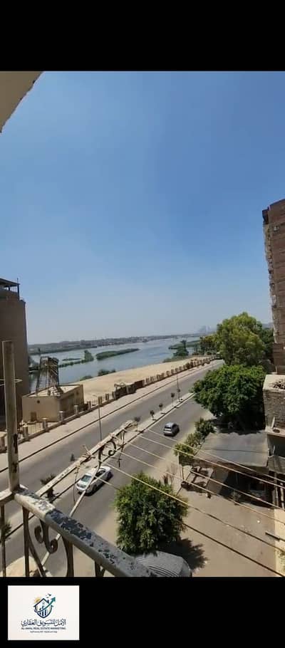 Apartment for rent empty Corniche Maadi Tura first row directly on the Nile near Al-Shorouk Club and Carrefour and close to the metro and all transportation and services