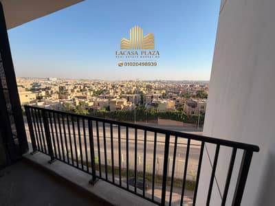 للإيجار أول سكن شقة 102م بالمطبخ والتكييفات في كمبوند زد بارك (ZED West) | فيو مفتوح