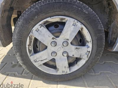 طقم جنوط بالعجل والطاسات الاصلي والصواميل الاصلي