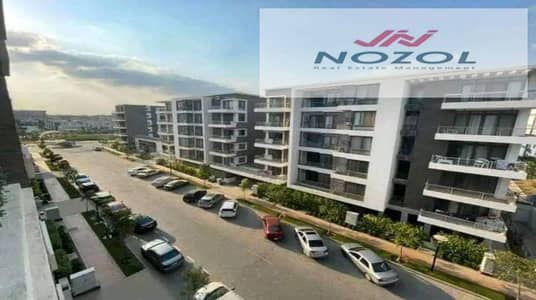 Apartment + garden for sale with installments prime location on Suez Road at Compound Taj City- New Cairo