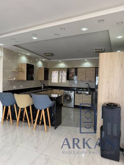 Own a 157m² apartment with a down payment of 942,000 and installments up to 8 years. Delivery in 12 months on Al-Nawadi Street.