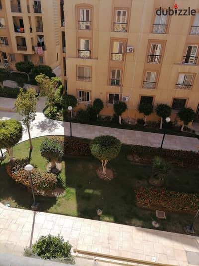 90-square-meter apartment for sale in Al Rehab 1, next to the Old Market and The Yard Mall.