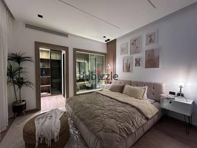 للبيع في Lake View Residence 1 | ارضي بحديقة خاصة 130م² + 50م² | 2 غرف | Garage خاص | فرش وتشطيبات Modern