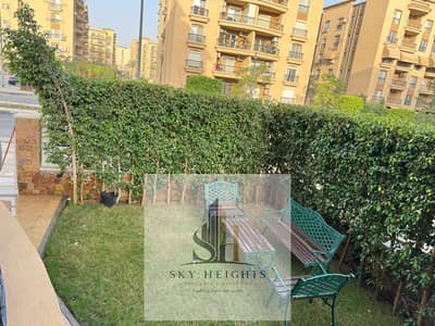 Furnished apartment for rent in Al Rehab, prime location near all services, ground floor with garden, special finishes, at a great price.