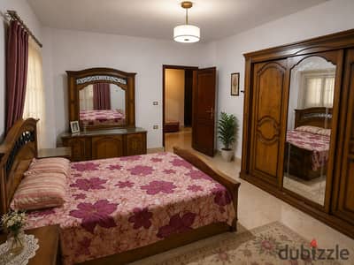 Distinct furnished apartment next to Al Rehab, Jasmine Villas 3 - A quiet and upscale location. A furnished apartment that combines comfort and privacy, 170 sqm, super deluxe on the roof, with a private terrace and an open view of the garden.