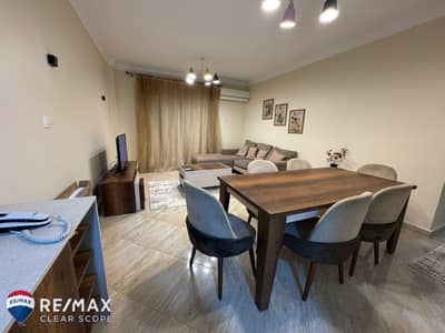 Furnished apartment for rent in Dar Misr Al Qarnafel | First occupancy | 130 sq m | 3 bedrooms | Master bedroom | Air conditioning | New furniture |