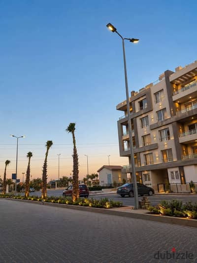 First-floor apartment for sale in the Cairo University Compound (Dahshur Link, 6th of October City); ultra-super-lux finish.
