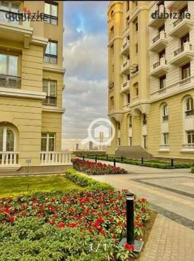 For quick sale: Apartment at half price, immediate occupancy, fully finished with air conditioning, in Garden City Compound, New Administrative Capita