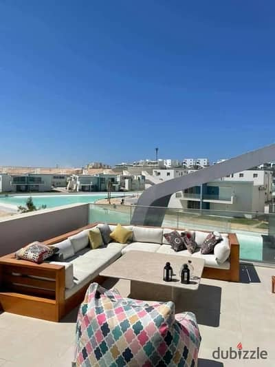 Two-bedroom chalet with a private roof directly on Crystal Lagoon with a clear view of the sea, fully finished with high-end air conditioning