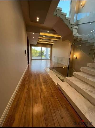 Double View Villa with Landscape and Lake An opportunity for living and investment in a prime location minutes from Palm Hills and Mountain View