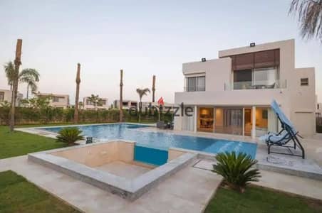 فيلا  مع Private Pool بفيو بانورامى للبحر من الدور الأرضى تشطيب فندقى بالتكيفات للبيع فى الساحل الشمالى دقايق من ساوث ميد طلعت مصطفى و غزاله