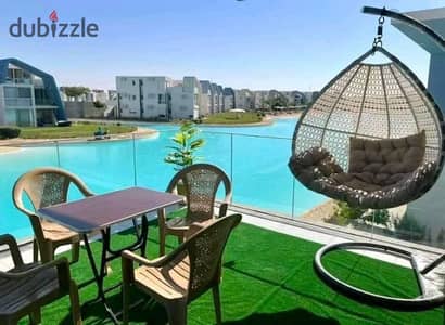 own a two-bedroom chalet with the highest rental yield first row on Crystal Lagoon minutes from Jun Sodic Salt Summer modon Ramla