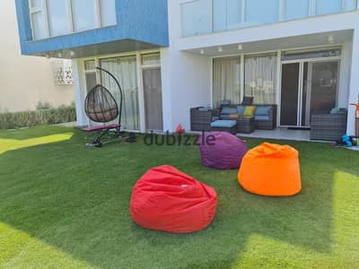 Ground floor chalet with garden full sea view of Ras El Hekma hotel-style with air conditioning for sale near Silver Sands Aura and UEA Ramla modon