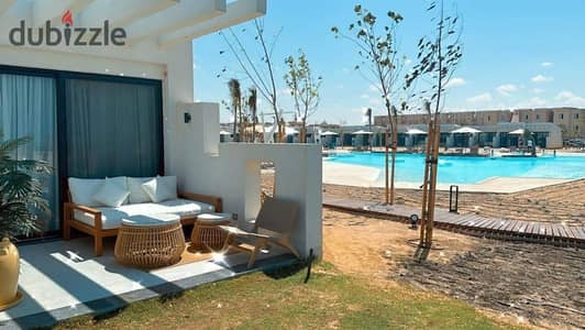 In the best location on the North Coast a fully finished two-bedroom chalet next to Modon and Waterway near Dee Bay and Summer Cali Coast Ras El Hekma