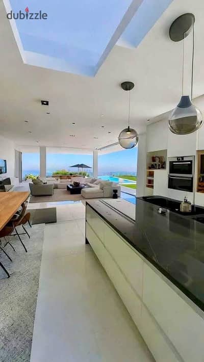 The deal of the season at the lowest price! A fully finished, air-conditioned chalet with an open view in Mountain View Ras El Hekma, for sale
