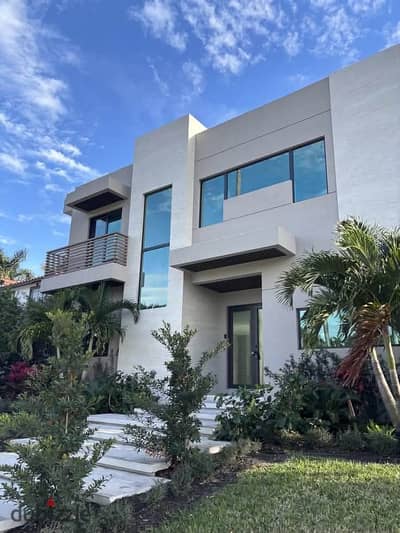 own a 240-meter standalone villa on the Suez Road directly next to Open Air Madinaty near Sodic and close to Mountain View Hyde Park
