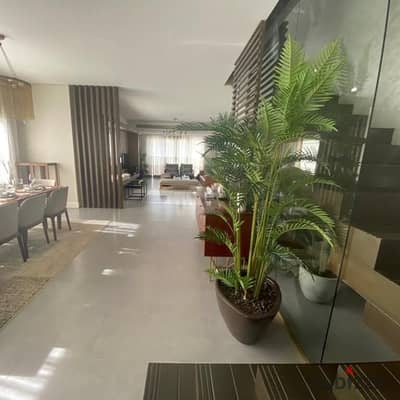 Corner 5 bedroom villa with lake view 50% discount for limited time on Suez Road near Madinaty The Spine towers and minutes from AUC New Cairo
