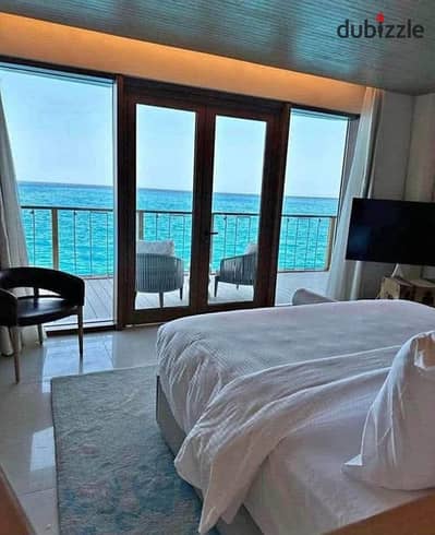 شالية غرفتين fully sea view بخصم 30 % لفترة محدودة finished + ACs+ kitchen بالتقسيط للبيع في الساحل الشمالي بالقرب من مراسي و هاسيندا باي و كالي كوست