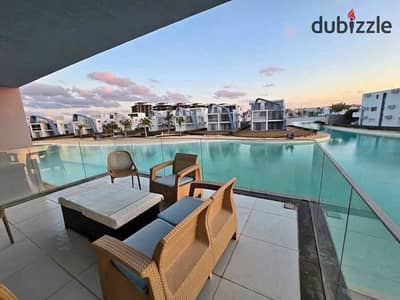 3BR chalet with panoramic open views first-row lagoon near delivery fully finished with ACs in North Coast near Dose Seashell Playa Marassi & Te