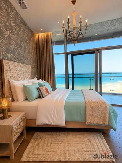 3BR chalet with panoramic open views first-row lagoon near delivery fully finished with ACs in North Coast near Dose Seashell Playa Marassi & Te