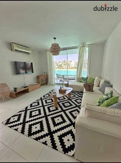 افضل واميز شالية lagoon & seaview بموقع بانورامي fully finished + ACs مميز وبخصم 35 % من سعر للبيع في الساحل الشمالي بالقرب مراسي و مدن و ذا مد و سيزن