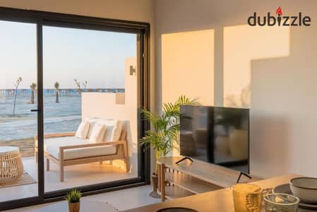 Ground-floor chalet with private garden first-row lagoon view fully finished with ACs and kitchen installments near delivery in D. O. S North Coast