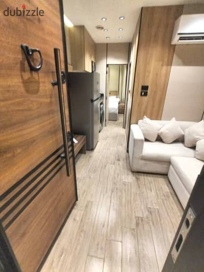 A unique investment opportunity with the highest rental return and profit. A studio for sale that you can pay in installments over 15 years with a 64% discount, located on the Suez Road, in Talalat next to Sodic and Al Burouj El Shorouk, in front of Madinaty.