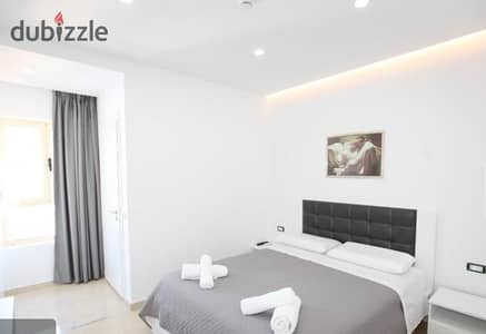 Apartment for sale double view luxury finished and equipped with ACs in the most prestigious resort in North Coast next to The Waterway and Soul
