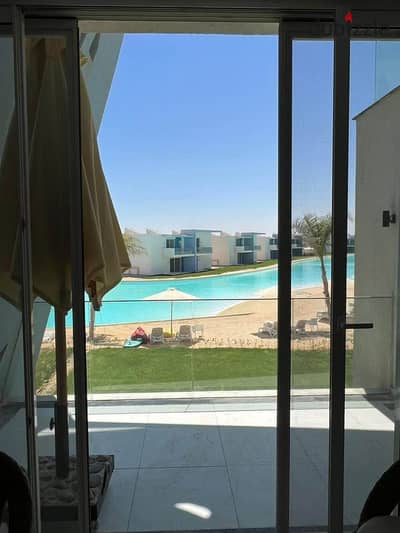 For sale at a great discount: a first-row chalet on Crystal Lagoon with a full sea view of Ras El Hekma next to Hacienda Hyde Park Ras El Hekma