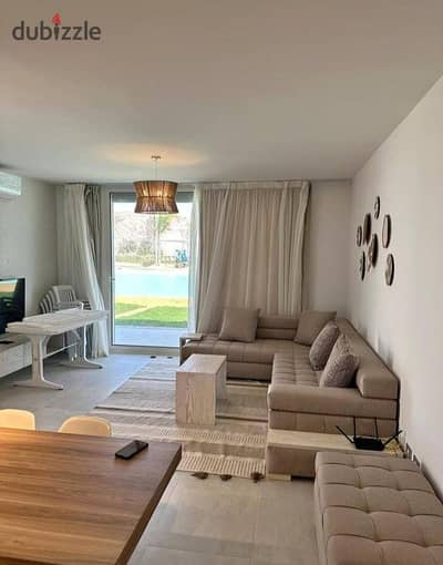 Two-bedroom chalet, first row on Crystal Lagoon, for sale in Ras El Hekma North Coast next to modon near Mountain View cali coast dose  La Vista