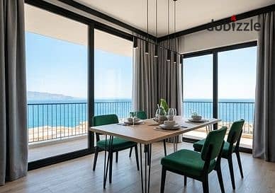 Luxury hotel lifestyle in premium fully integrated North Coast village own chalet fully finished with ACs next to Nations of Sky new land