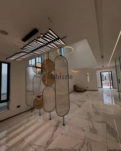 For those seeking upscale living, a villa is for sale in a prime location next to Madinaty minutes away from the American University near sarai