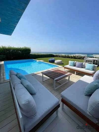 Just steps from the sea, a corner townhouse villa at a bargain price near Ras El Hekma modon for sale close to Hacienda La Vista and Silver Sands