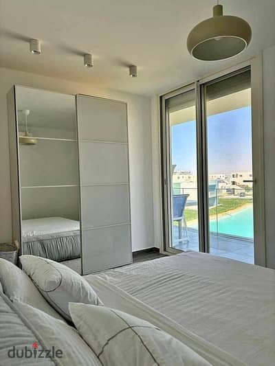 First row on Crystal Lagoon fully finished chalet for sale with air conditioning in Ras El Hekma next to Modon and near Hacienda and Hyde Park
