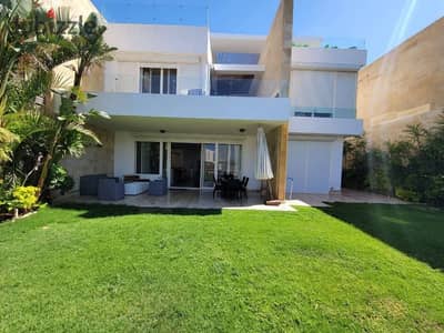 enjoy a full sea view from the ground floor of this corner townhouse villa next to Hacienda and Seazen near South Mead and De Bay La Vista.