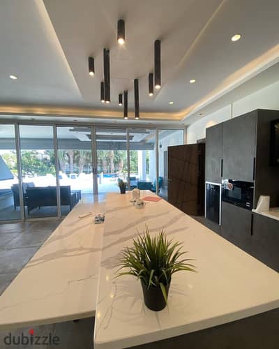 For sale 12 year villa 5 bedrooms with a distinctive garden view in Butterfly on the Suez Road near Mountain View and SODIC.