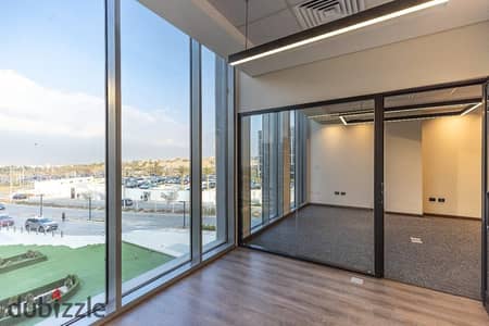 Office for sale fully finished with ACs immediate viewing and 7 year installments on Suez Road New Cairo near Cairo Airport Rehab and Mivida