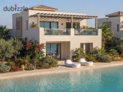 Own a standalone lagoon front villa at THE MED North Coast Enjoy tropical island living with waterfall views Luxury home and smart investment near Mod